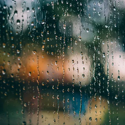 Rain Drops on Blurred Window Glass