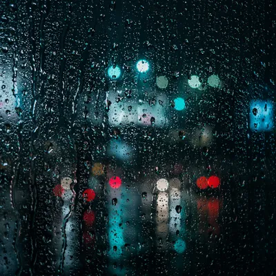 Rain Droplets on Window at Night