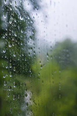 Rain Drops on Blurred Window Glass