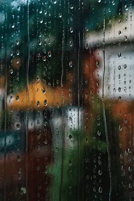 Rain Drops on Blurred Window Glass