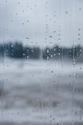 Rain Drops on Window Over Winter Shore