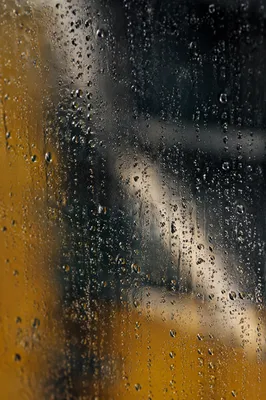 Rain Drops on Stormy Window Glass