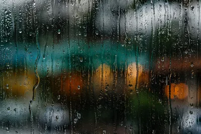 Rain Drops on Blurred Window Glass