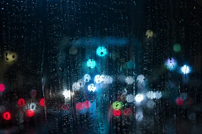 Rain Droplets on Window at Night