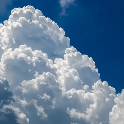 Dramatic Cumulus Clouds in Deep Blue Sky