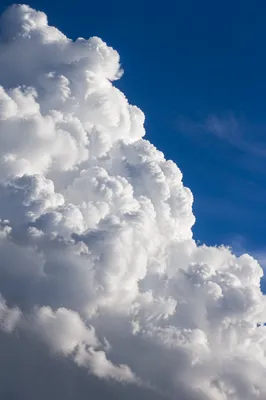 Dramatic Cumulus Clouds in Deep Blue Sky