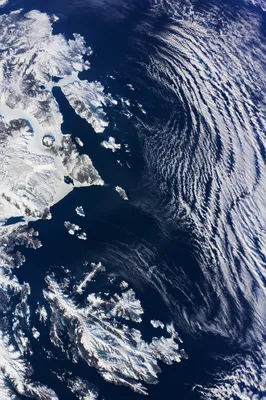 Dramatic Arctic Coastline with Cloud Streets