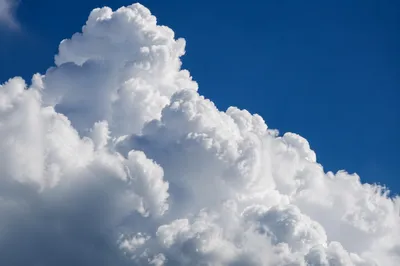 Dramatic Cumulus Clouds in Deep Blue Sky