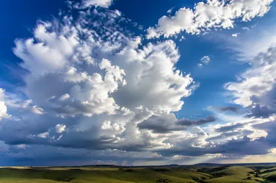 Dramatic Blue Sky Over Quiet Grassland