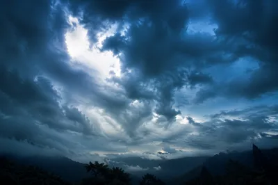 Dramatic Blue Sky with Layered Storm Clouds