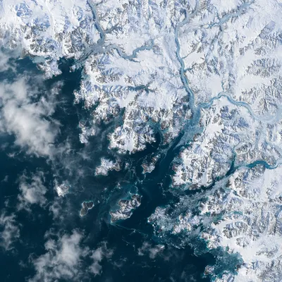 Snow Covered Winter Coastline from Above