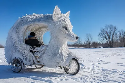 Whimsical Snowfield Cart Under Blue Winter Sky