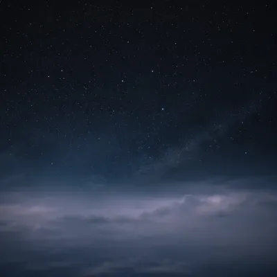 Serene Starry Night Sky Above Mist