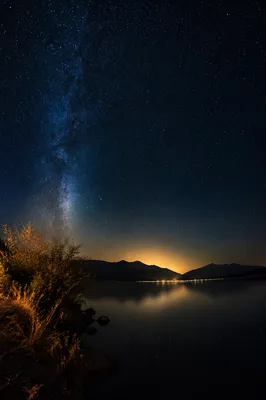 Starry Night Lakeshore with Golden Horizon