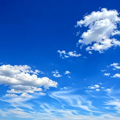 Sunny Summer Blue Sky with Soft Clouds