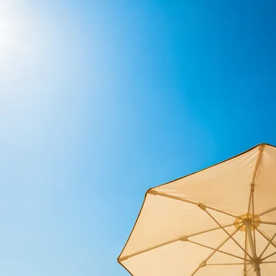Sunny Blue Sky with Beach Umbrella