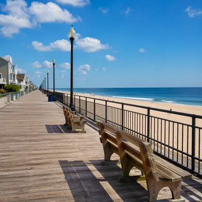 Sunny Summer Boardwalk by Calm Blue Ocean