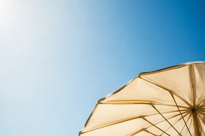 Sunny Blue Sky with Beach Umbrella