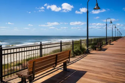 Sunny Summer Coastal Boardwalk by Blue Ocean