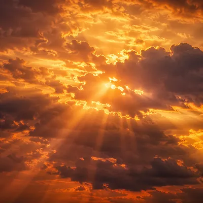 Golden Sun Rays Breaking Through Clouds