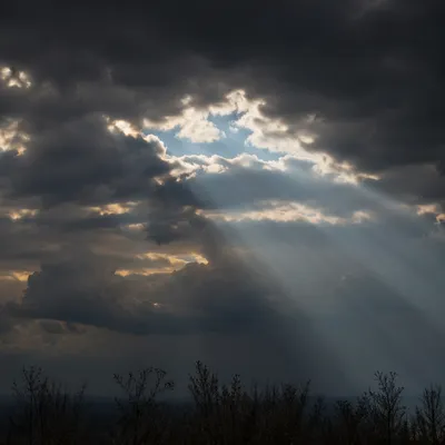 Sun Rays Breaking Through Storm Clouds