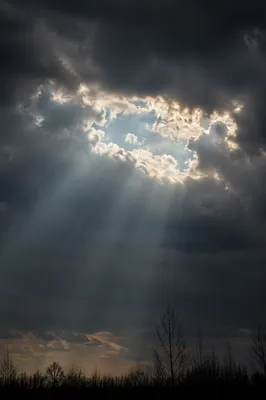 Sun Rays Breaking Through Storm Clouds