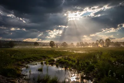 Sun Rays Breaking Through Storm Clouds