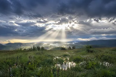 Sun Rays Breaking Through Storm Clouds