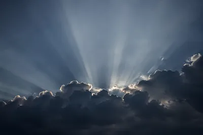Dramatic Sun Rays Through Storm Clouds