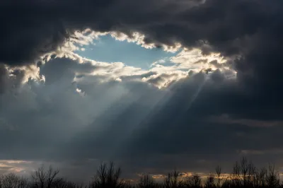Sun Rays Breaking Through Storm Clouds
