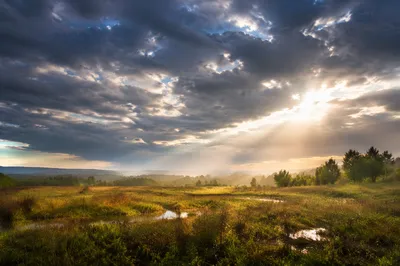 Sun Rays Breaking Through Storm Clouds