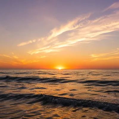 Golden Sunset Over Calm Ocean Horizon