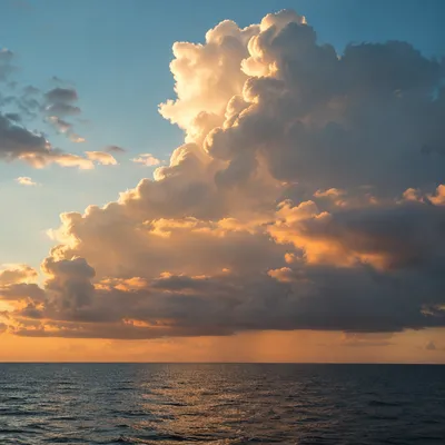 Golden Hour Ocean Horizon with Glowing Clouds