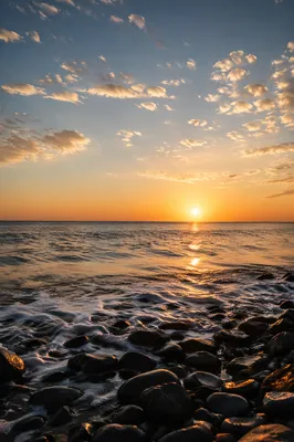 Golden Sunset Over Calm Ocean Horizon