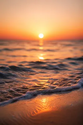 Golden Sunset Ocean Horizon with Gentle Waves