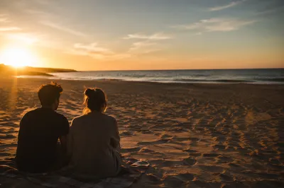 Golden Sunset Beach Horizon with Couple
