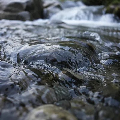 Clear Mountain Stream Over Dark Stones