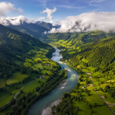 Winding River Through Lush Green Valley