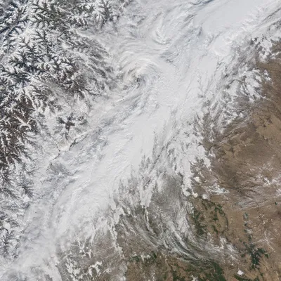 Aerial Blizzard Over Mountain and Plains