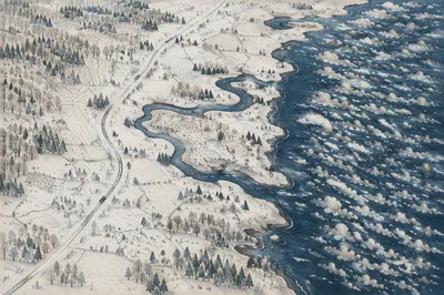 Coastal Blizzard Over Snow Covered Winter Road