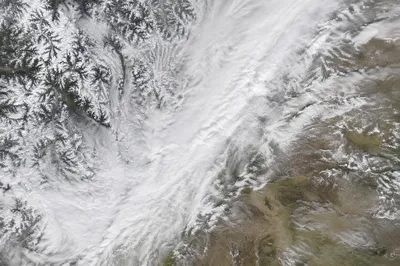 Aerial Blizzard Over Mountain and Plains