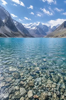 Crystal Clear Alpine Lake with Visible Pebbles