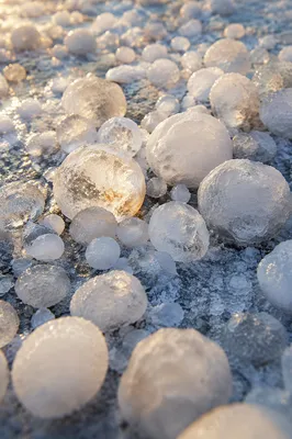 Hailstones on Frozen Ground After Storm