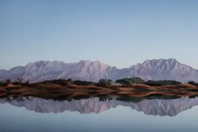 Calm Mountain Lake Reflection at Dawn