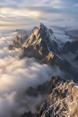 Majestic Mountain Peak Above Morning Clouds