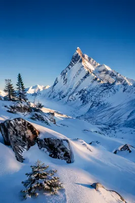 Snow Capped Mountain Peak at Sunrise