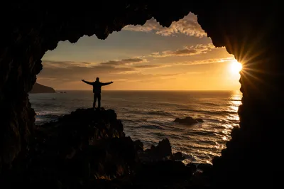 Ocean Sunset Framed by Volcanic Rocks