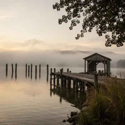Peaceful Morning Lake Dock with Mist