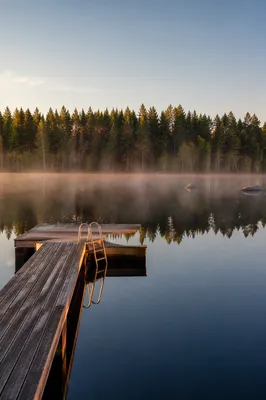 Peaceful Lake Dock at Golden Sunrise