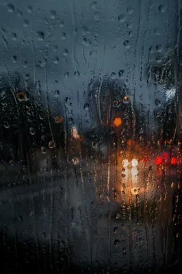 Moody Rain Drops on Window Glass